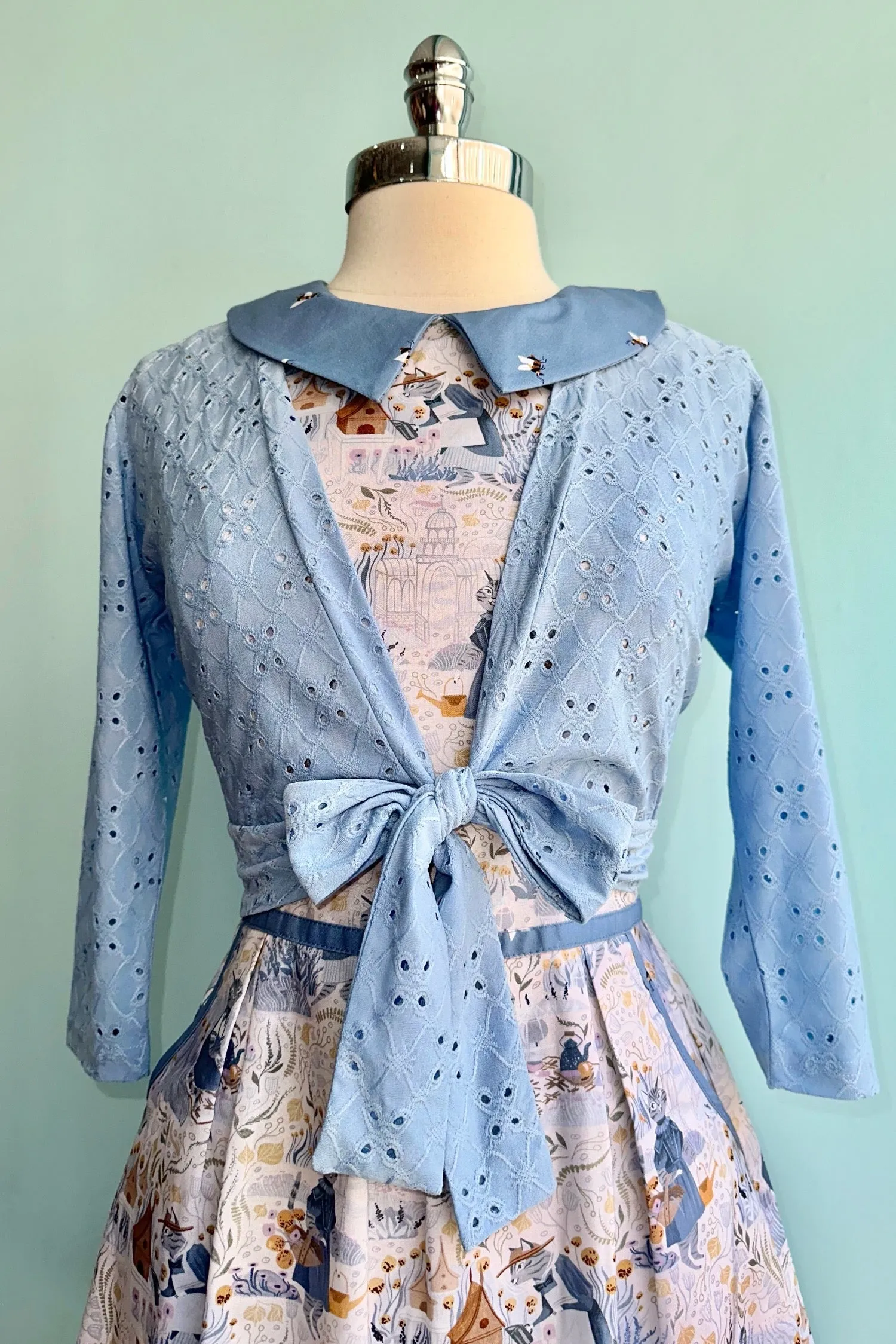 Light Blue Eyelet Sweet Sweater by Heart of Haute